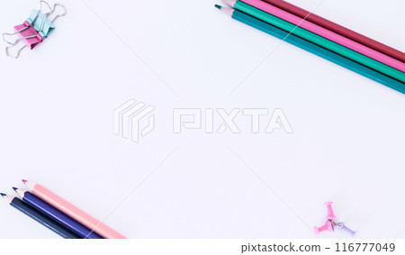 Template. White background with pencils. The image shows Free Space For Text on a white sheet. Bright picture. Concept Image Template. White background with pencils. The image shows Free Space For Text on a white sheet. Bright picture. Concept Image 116777049