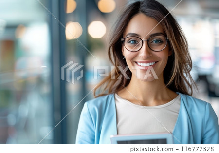 Woman Holding Tablet in Office Woman Holding Tablet in Office 116777328