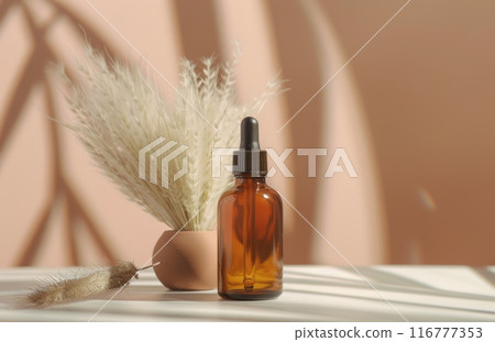 Amber Bottle With Dropper on White Table Amber Bottle With Dropper on White Table 116777353