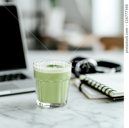 Matcha Latte and Laptop on Marble Table Matcha Latte and Laptop on Marble Table 116777366