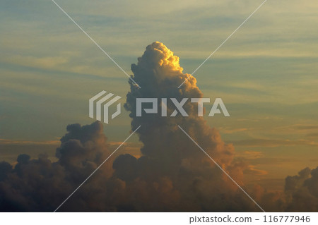 Sunset sky with bright colorful orange and yellow clouds. Panoramic skyscape 116777946