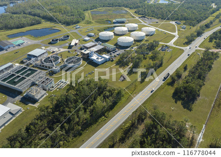 Modern water cleaning facility at urban wastewater treatment plant. Purification process of removing undesirable chemicals, suspended solids and gases from contaminated liquid Modern water cleaning facility at urban wastewater treatment plant. Purification process of removing undesirable chemicals, suspended solids and gases from contaminated liquid 116778044