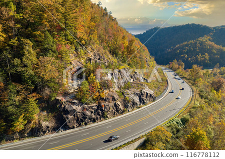 Highway road in USA. American freeway road with fast driving cars. Transportation infrastructure in North Carolina Appalachian mountains Highway road in USA. American freeway road with fast driving cars. Transportation infrastructure in North Carolina Appalachian mountains 116778112