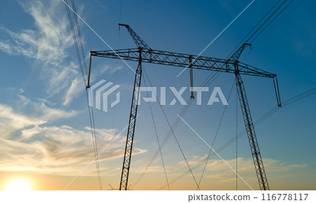 High voltage tower with electric power lines at sunset. Transmission of electricity 116778117