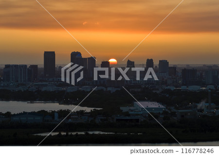 Urban sunset landscape of downtown district of Tampa city in Florida, USA. Dramatic skyline with high skyscraper buildings in modern american megapolis Urban sunset landscape of downtown district of Tampa city in Florida, USA. Dramatic skyline with high skyscraper buildings in modern american megapolis 116778246