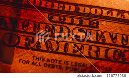 Process of checking the authenticity of hundred dollar bank note under deep red light Process of checking the authenticity of hundred dollar bank note under deep red light 116778986