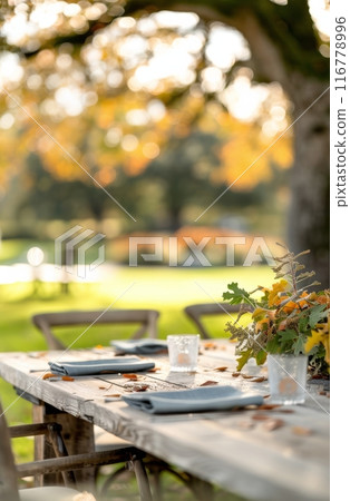Outdoor Table Setting With Fall Foliage Outdoor Table Setting With Fall Foliage 116778996