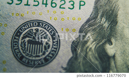 Process of examining authenticity of of hundred dollar bill Process of examining authenticity of of hundred dollar bill 116779070