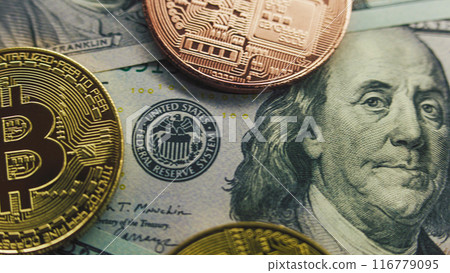 Golden bitcoin coins and hundred dollar bills 116779095