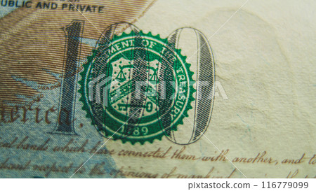 Process of examining authenticity of of hundred dollar bill 116779099