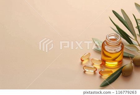 Olive Oil Capsules and Green Olives on White Background 116779263