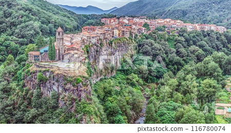 Panoramic drone picture of the historic town of Castellfollit de la Roca in Catalonia in the morning light 116780074
