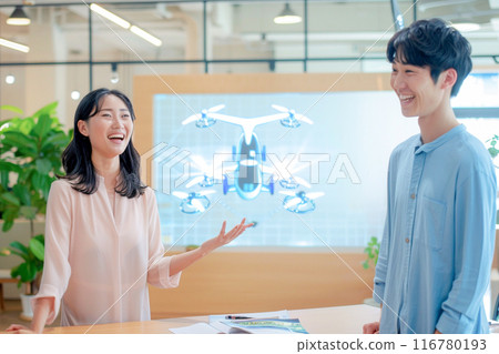 Female designer presenting a flying car design_4 Female designer presenting a flying car design_4 116780193