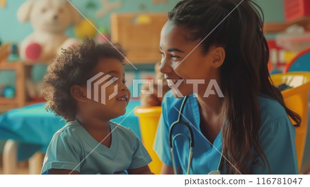 A cheerful pediatric nurse is caring for a young child in a vibrant daycare setting 116781047
