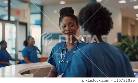 Healthcare Professionals Engaging in Collaborative Dialogue at the Hospital Reception Desk 116781059