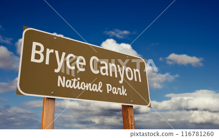 Bryce Canyon National Park (Utah) Road Sign Against Blue Sky and Clouds. 116781260