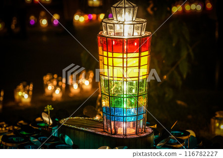 Lamp decorated with candles 116782227