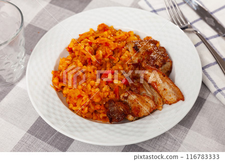 Barley with cabbage served with fried brisket 116783333