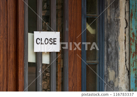 Closed sign on the door Closed sign on the door 116783337