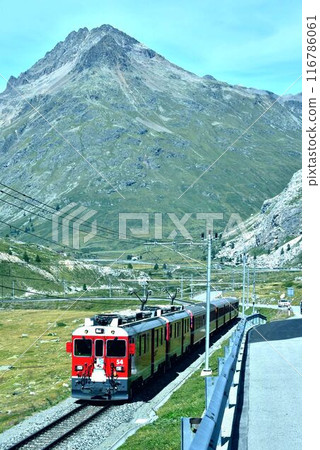 A train heading to Ospizio station, the highest point on the Bernina line A train heading to Ospizio station, the highest point on the Bernina line 116786061