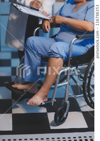 Asian female medical doctor use stethoscope to listen examine check senior elderly patient heart 116786353