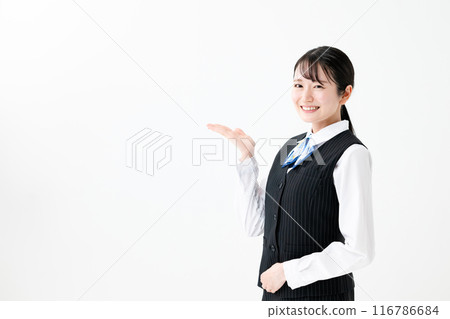 A woman in uniform waving her hands 116786684