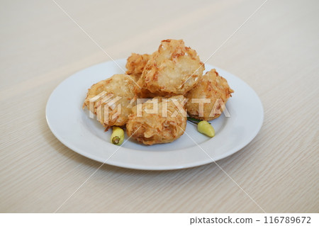 Bakwan sayur or bala-bala or ote-ote is vegetebles fritter from Indonesia Bakwan sayur or bala-bala or ote-ote is vegetebles fritter from Indonesia 116789672