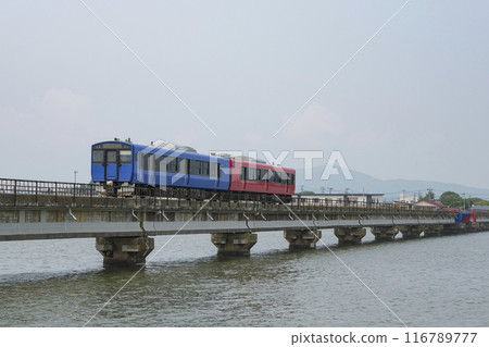 An Oga Line train crossing the Funakoshi Suido iron bridge An Oga Line train crossing the Funakoshi Suido iron bridge 116789777
