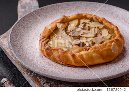 Delicious sweet crispy galettes with fruits and cinnamon Delicious sweet crispy galettes with fruits and cinnamon 116789942