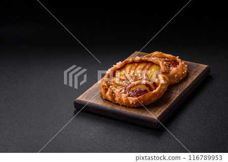 Delicious sweet crispy galettes with fruits and cinnamon 116789953