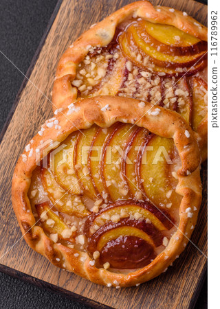 Delicious sweet crispy galettes with fruits and cinnamon 116789962