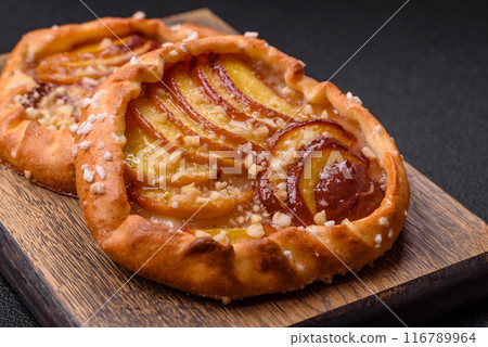 Delicious sweet crispy galettes with fruits and cinnamon Delicious sweet crispy galettes with fruits and cinnamon 116789964