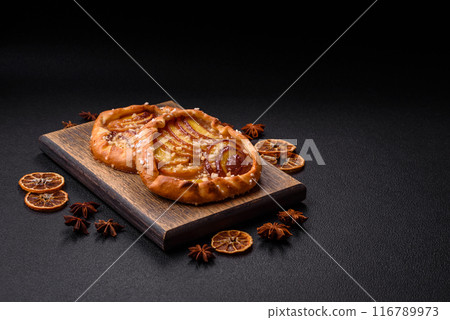 Delicious sweet crispy galettes with fruits and cinnamon Delicious sweet crispy galettes with fruits and cinnamon 116789973