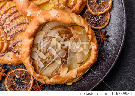 Delicious sweet crispy galettes with fruits and cinnamon Delicious sweet crispy galettes with fruits and cinnamon 116789986