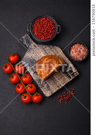 Smoked meatloaf or sausage with salt, spices and herbs 116790018