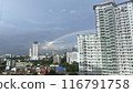 A rainbow on the balcony of an apartment building 116791758