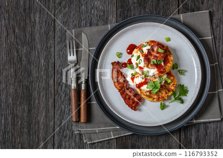 tasty cheese sweet corn pancakes with fried bacon 116793352