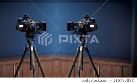 Professional camera on a tripod Professional camera on a tripod 116793897