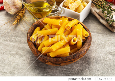 Italian cuisine - dry tortiglioni pasta 116794488