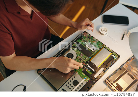 Repairman Working With Board Of Computer 116794857