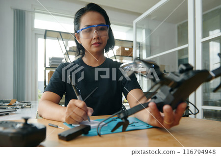 Master Making List Of Broken Details Of Drone 116794948