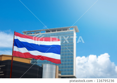 A Thailand flag with the colors red, white, and blue is flying A Thailand flag with the colors red, white, and blue is flying 116795236