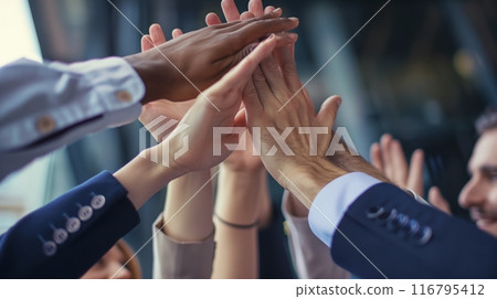 Business professionals exchange high fives to celebrate their teams success, displaying unity and excitement in recognition of their collaborative achievement. AI Generated Business professionals exchange high fives to celebrate their teams success, displaying unity and excitement in recognition of their collaborative achievement. AI Generated 116795412