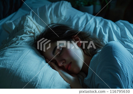 Woman sleep in bed at night 116795630