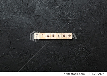 trustee word written on wood block. trustee text on table, concept 116795974