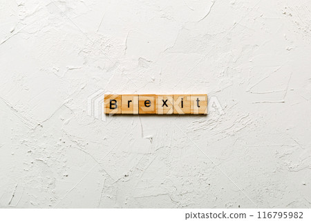 Brexit word written on wood block. Brexit text on cement table for your desing, concept 116795982