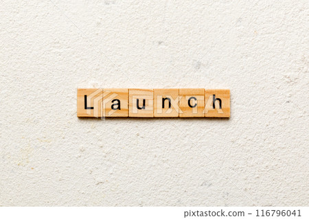 launch word written on wood block. launch text on table, concept 116796041