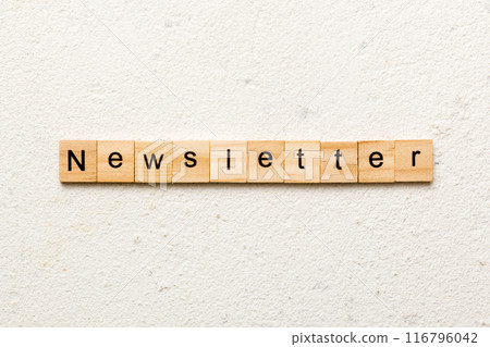 newsletter word written on wood block. newsletter text on table, concept 116796042