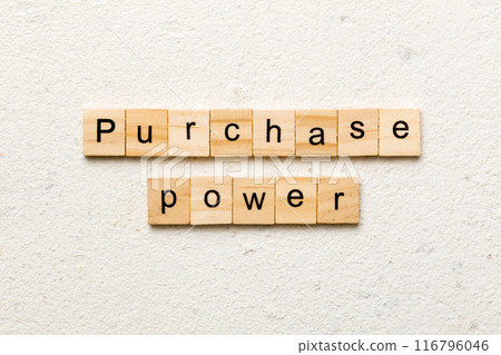 Purchase power word written on wood block. Purchase power text on cement table for your desing, concept 116796046