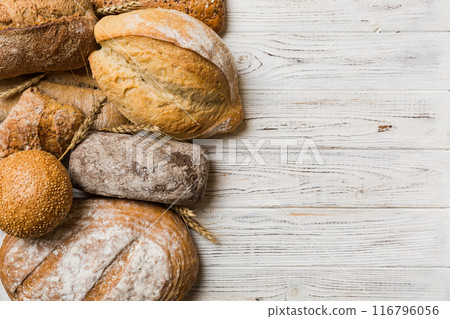 Homemade natural breads. Different kinds of fresh bread as background, top view with copy space 116796056